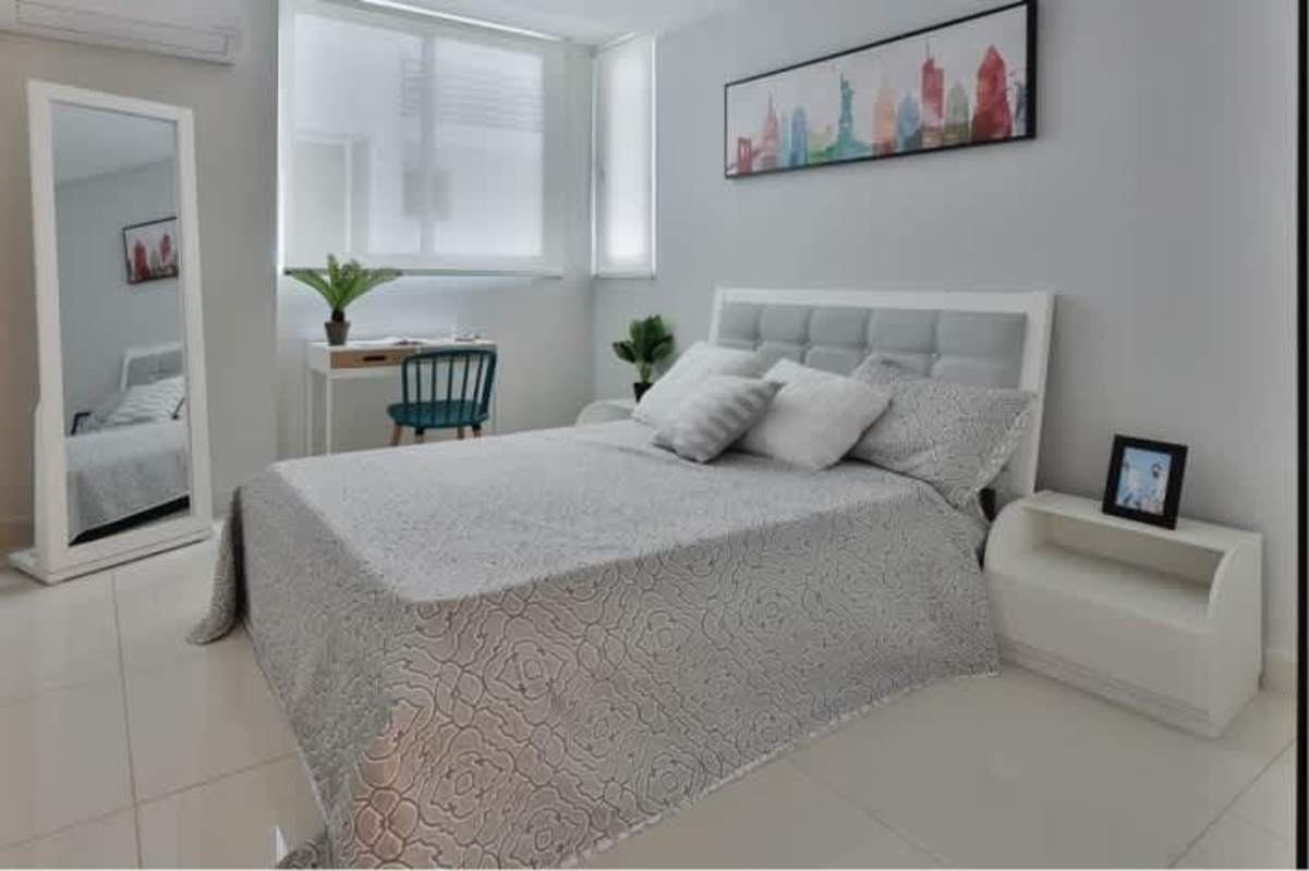 Bright master bedroom with city view, built-in closet in PH Atrium Tower San Francisco