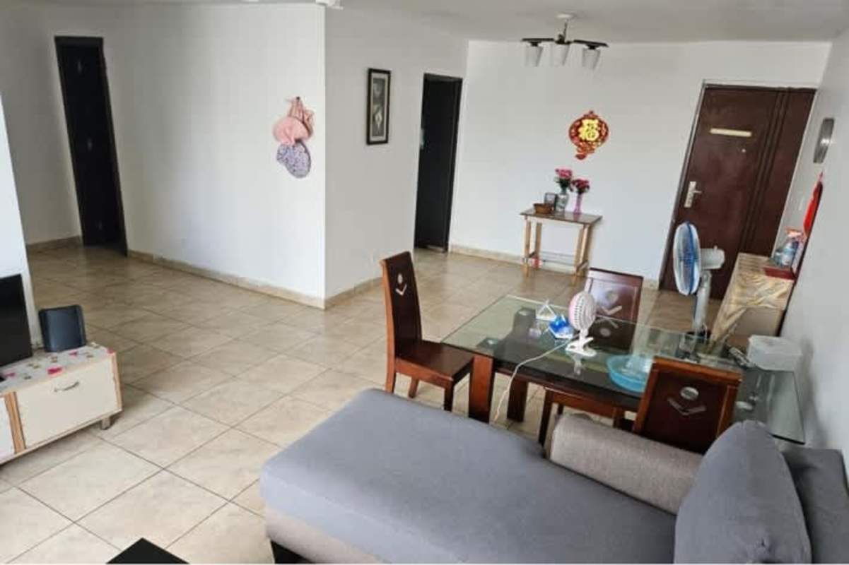 Modern open concept living and dining area with tiled floors in PH Kubic 2 Panama City