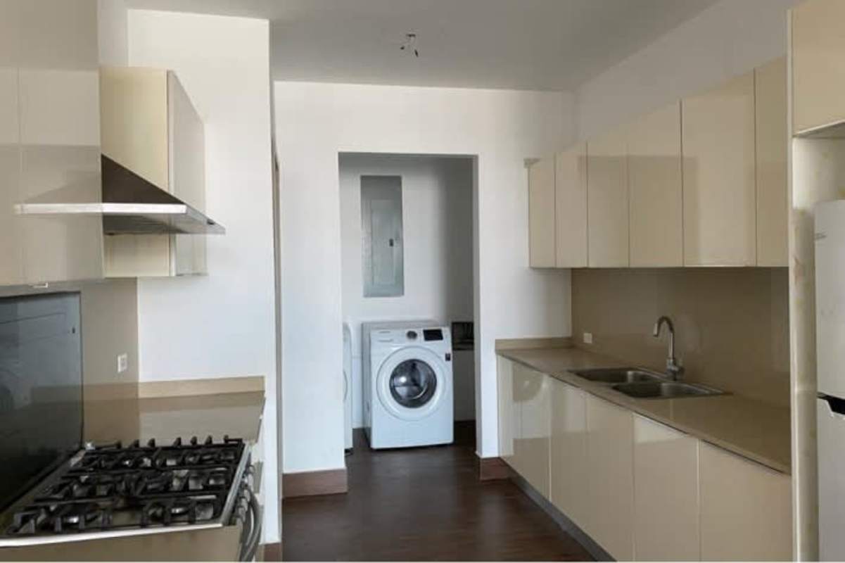 Kitchen and laundry area Costa Sur residence for sale Juan Díaz Panama
