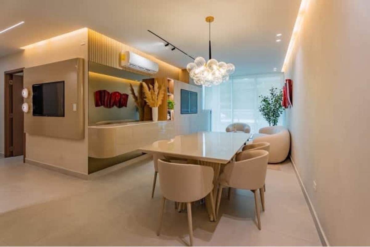 Contemporary kitchen with granite countertops and light cabinetry at PH Condado Park Panama City