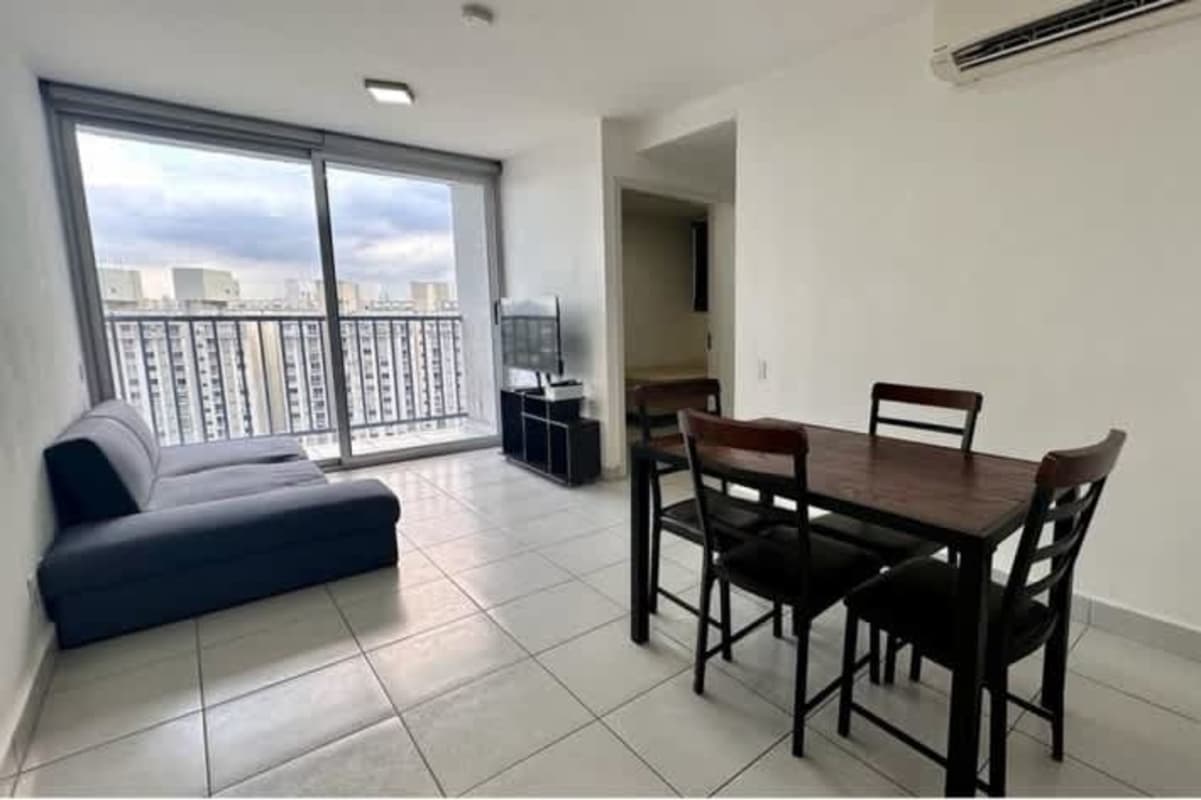 Living dining area large glass doors balcony PH ILO Pedregal apartment