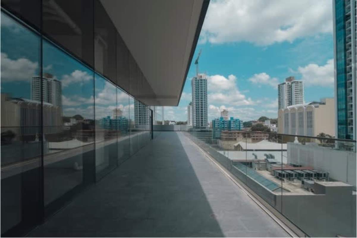 Expansive balcony terrace with glass railing and skyline views Bella Vista Panama