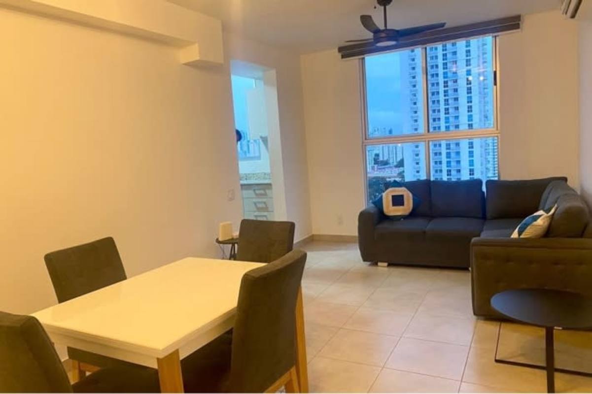 Rooftop children play zone with plastic slides, safe turf and skyline views PH Gaudí Panama City