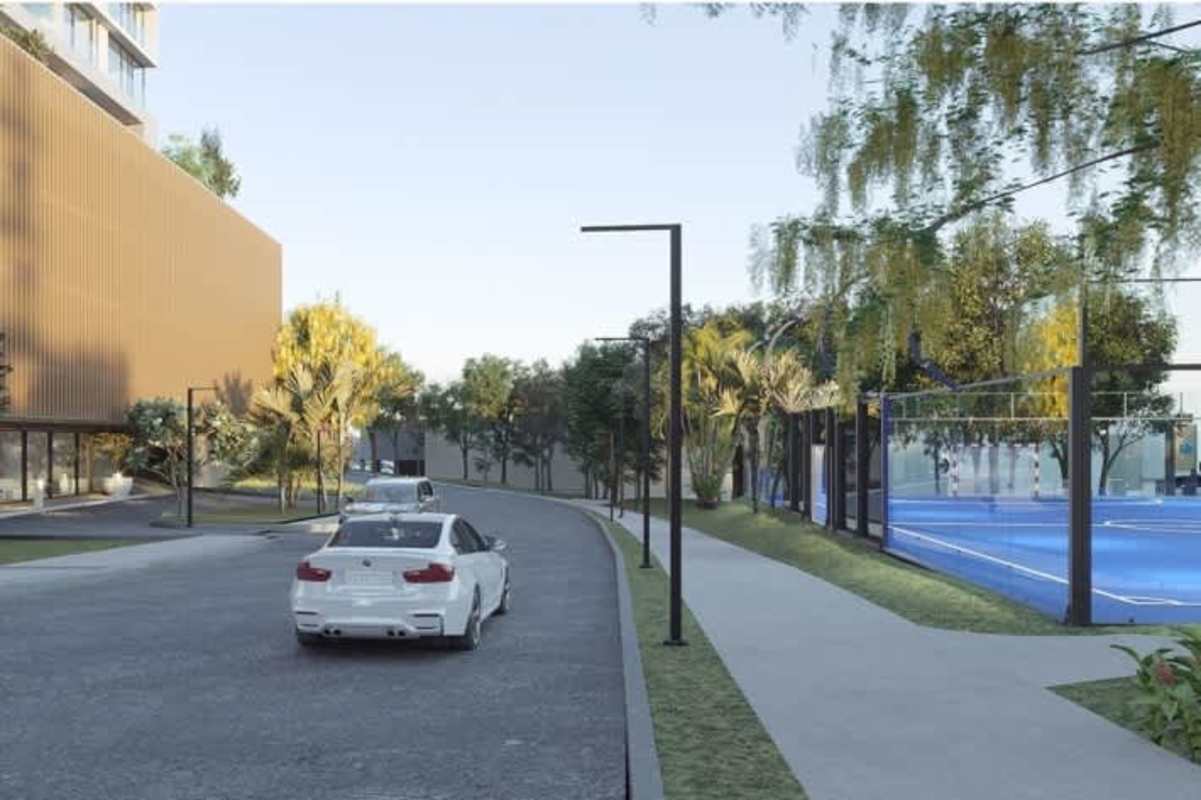 Multi-use sports court surrounded by green landscaping in PH Natura Panama