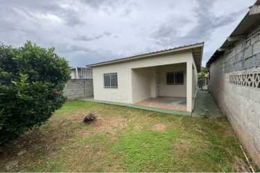 Fenced backyard patio garden area in affordable La Chorrera house for sale