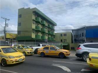 Street view of multi-story hotel with balconies La Chorrera Panama