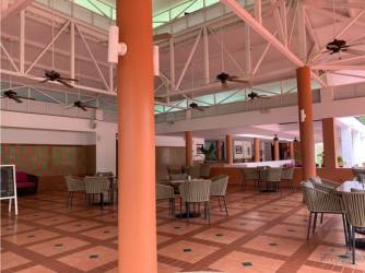 Covered patio terrace with lush garden views perfect for outdoor living in Río Hato beach villa