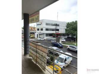 Balcony overlooking Avenida Las Americas busy commercial street Venture Plaza La Chorrera Panama