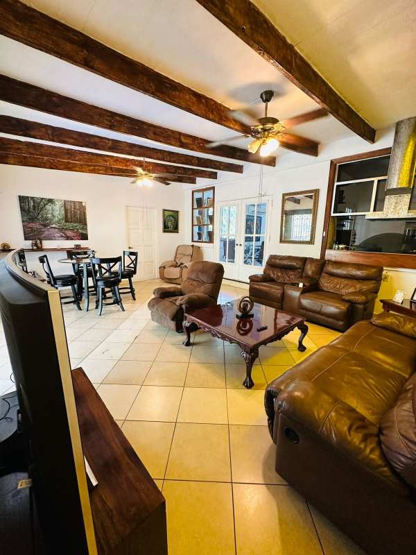 Sunroom with large windows, decorative Mediterranean tiles, bright terrace Balboa Ancón