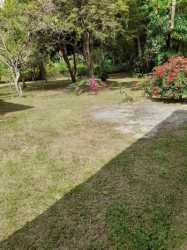 Orange house porch with hammocks and garden view Campana Capira Panama