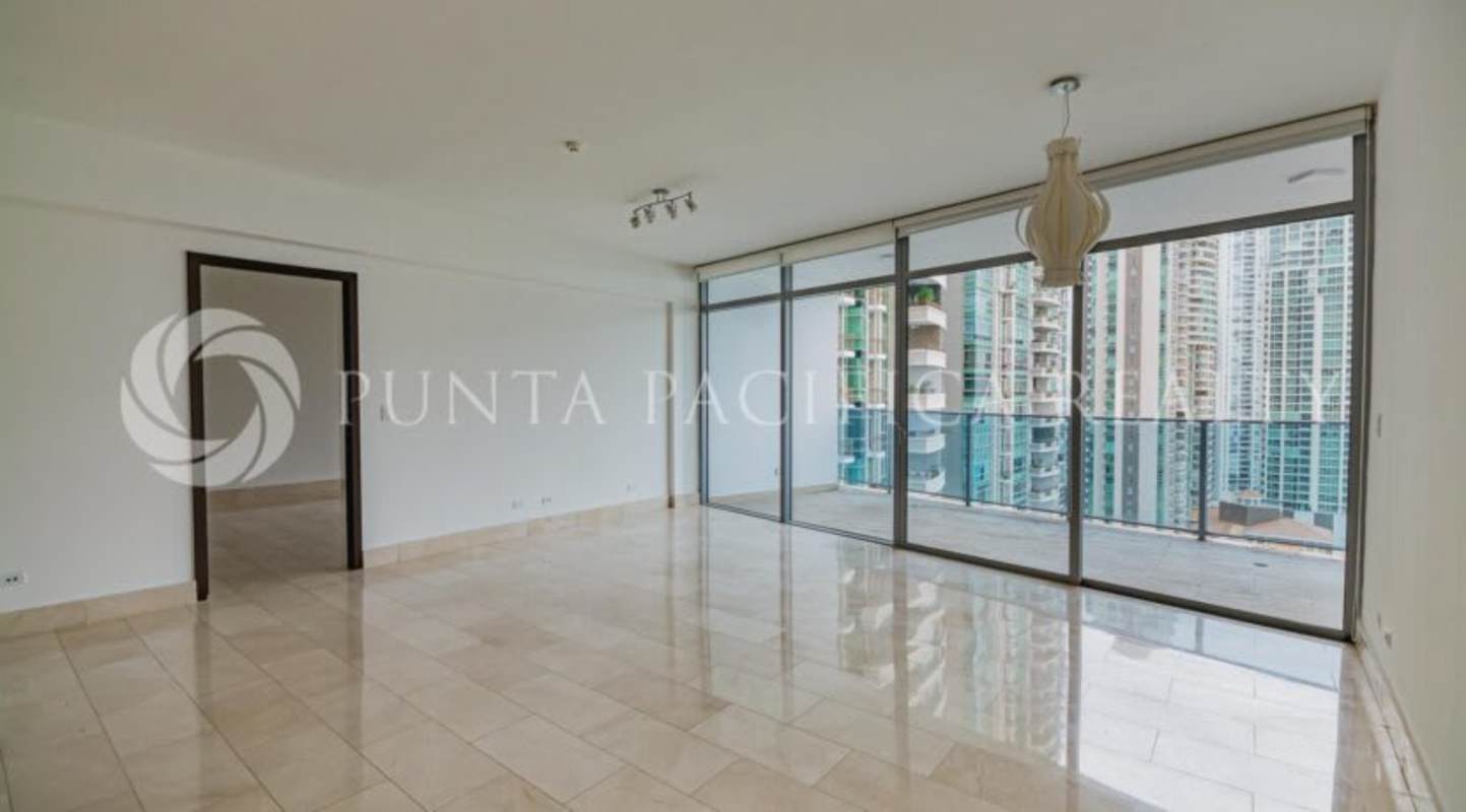 Modern apartment living dining room tile floors balcony access Grand Tower