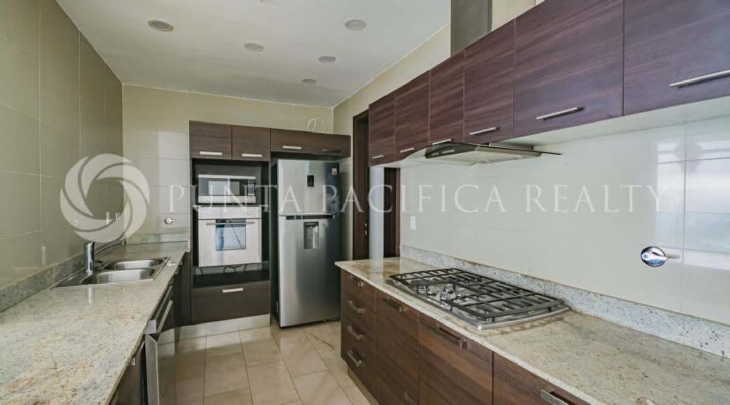 Spacious bedroom with ocean view windows built-in closets Grand Tower Punta Pacifica