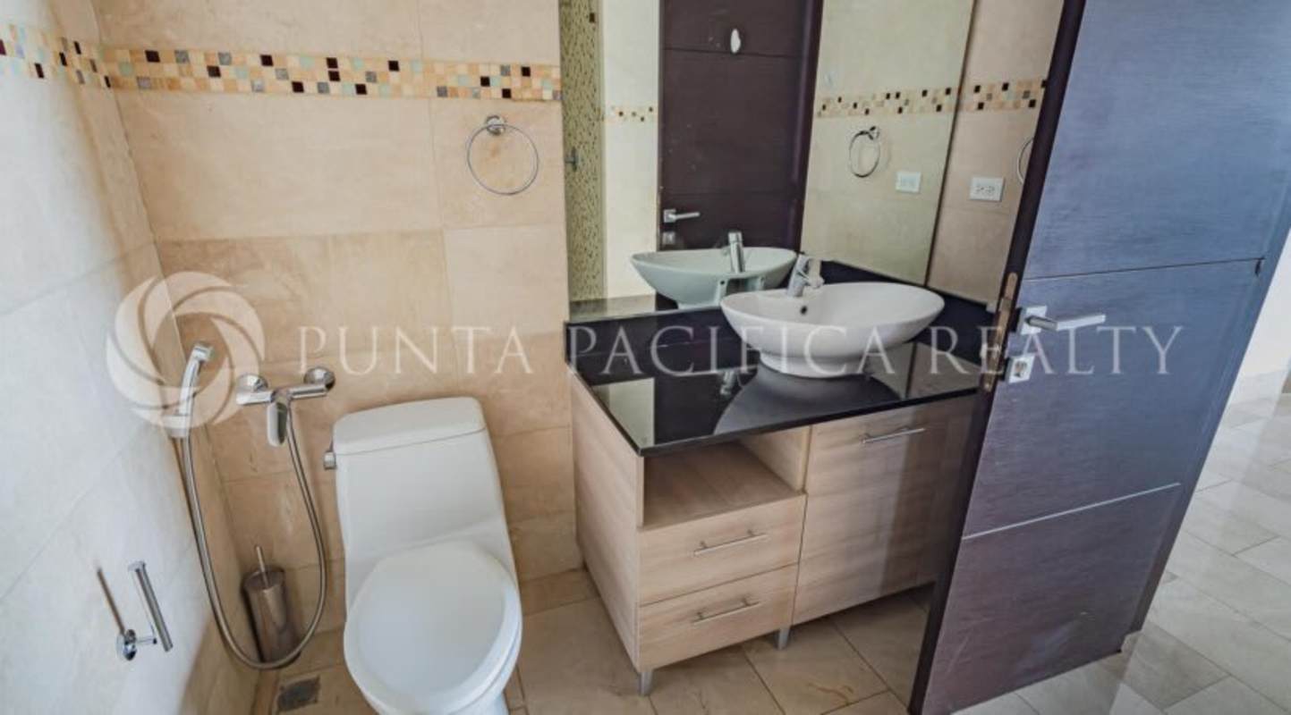 Elegant bathroom vessel sink mosaic tile vanity Grand Tower Punta Pacifica apartment