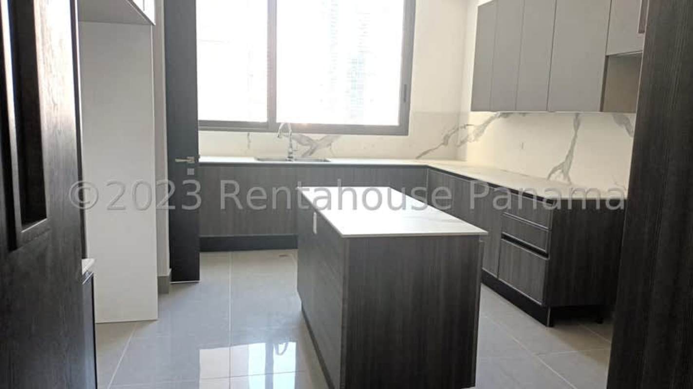 Modern marble-finished kitchen with top appliances in PH Sea Point Punta Paitilla luxury ocean view apartment Panama