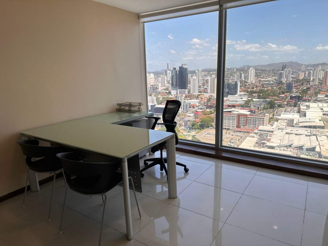 Modern office space with city skyline views from floor-to-ceiling windows in Oceania Business Plaza Tower 1000