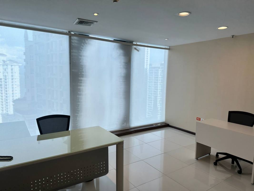 Private office featuring panoramic ocean and skyline views in Oceania Business Plaza Tower 1000