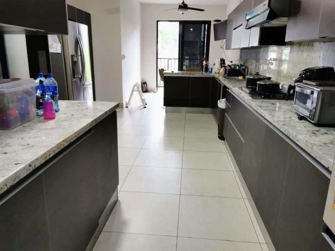 Indoor patio sunroom with seating and plants Embassy Club Panama