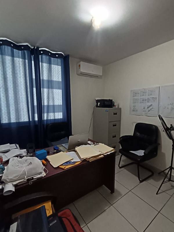 Functional home office with desk and file cabinet at PH Condado Vista Condado del Rey Panama
