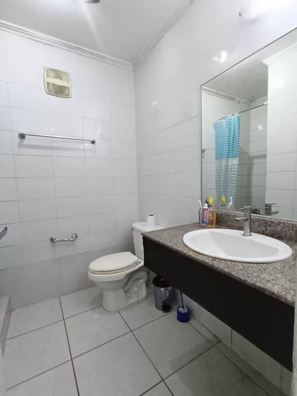 Bathroom with granite top vanity and mirror in PH Condado Vista Condado del Rey Panama