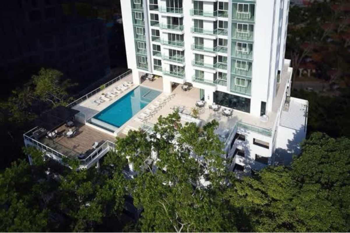 Safe outdoor playground with colorful equipment in PH Bonavista The Park residential tower Panama City