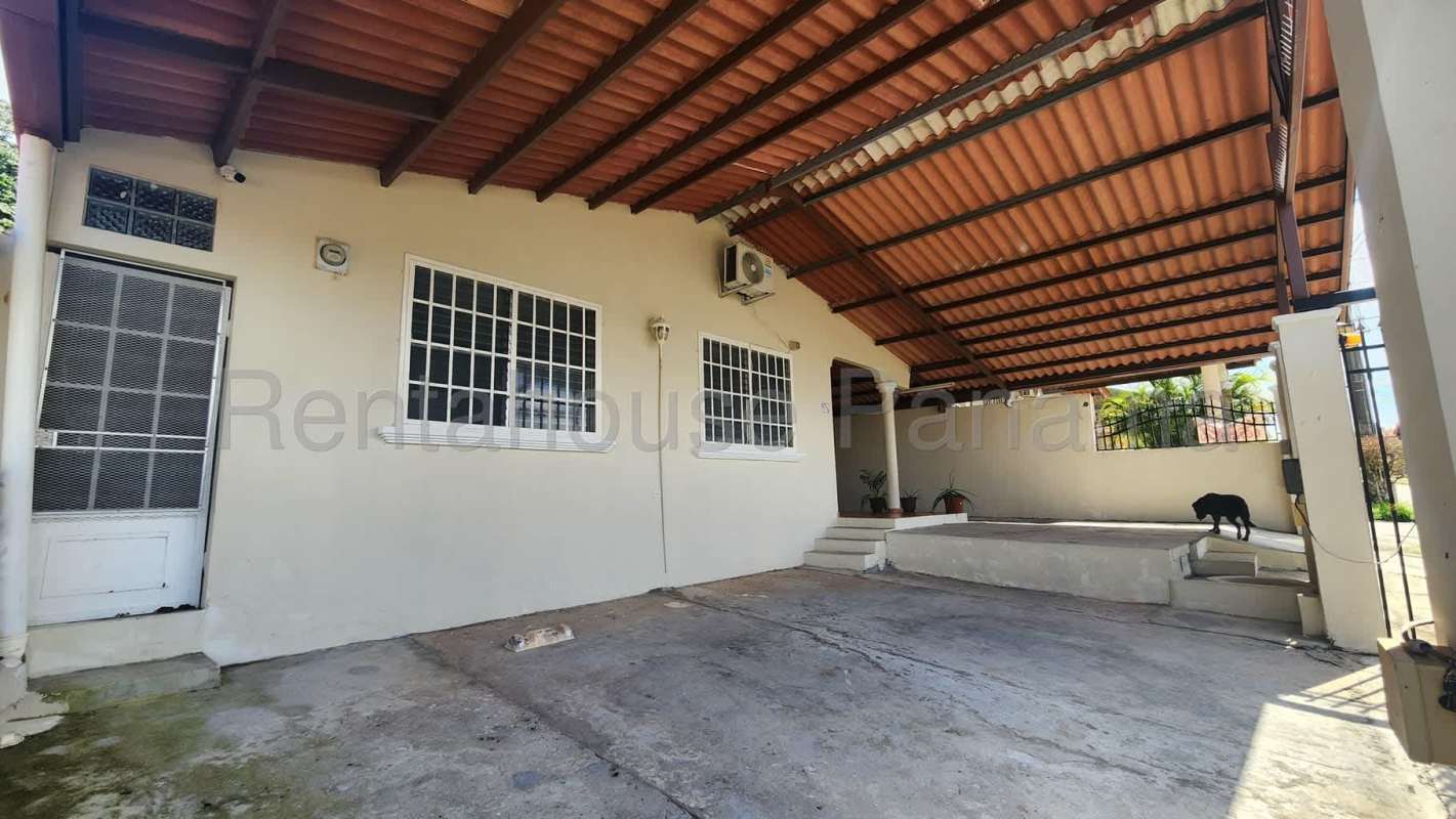 Bedroom with ceramic flooring, AC and fan overlooking garden Brisas del Golf Panama City