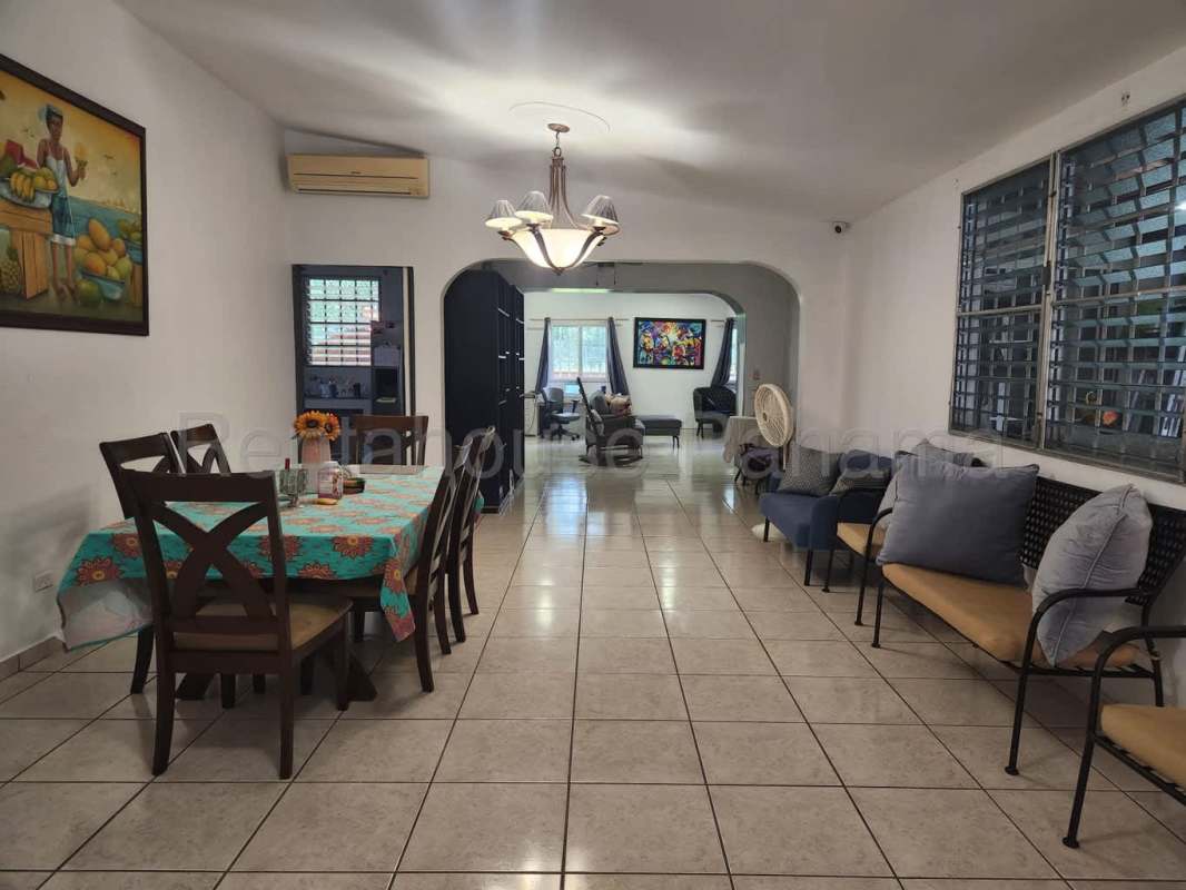 Covered terrace space with barbecue and adjacent children's playground in Brisas del Golf Panama