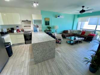 Contemporary bathroom at Sanctuary Playa Caracol with glass shower and modern vanity