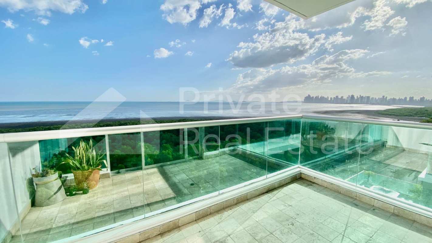 Modern glass-railed balcony with stunning Pacific and city skyline view