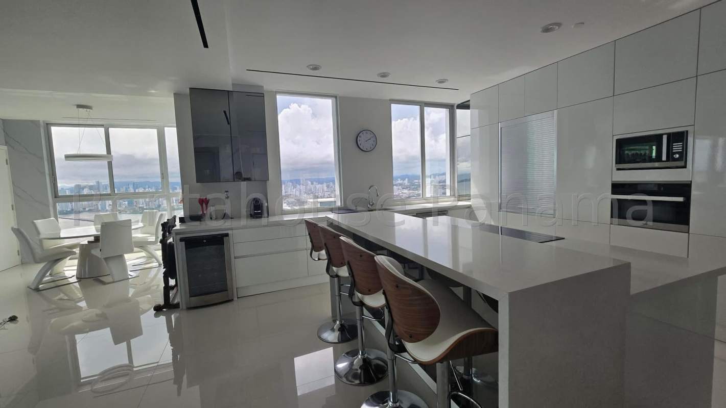 Modern luxury bathroom with jacuzzi tub, glass shower, marble finishes at PH Ocean One Costa del Este Panama
