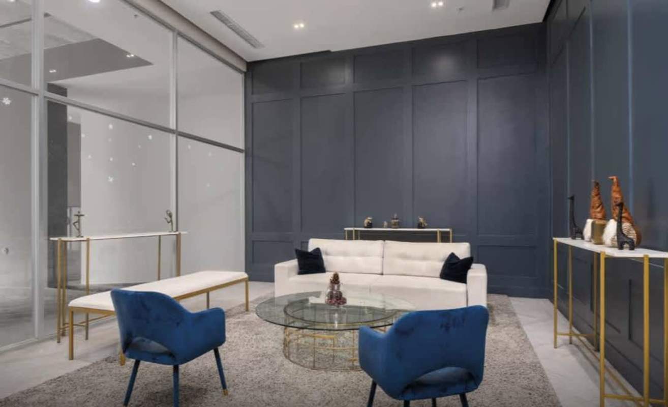 Bright gym with exercise equipment treadmills weights at PH Áthas 12 de Octubre Panama apartment