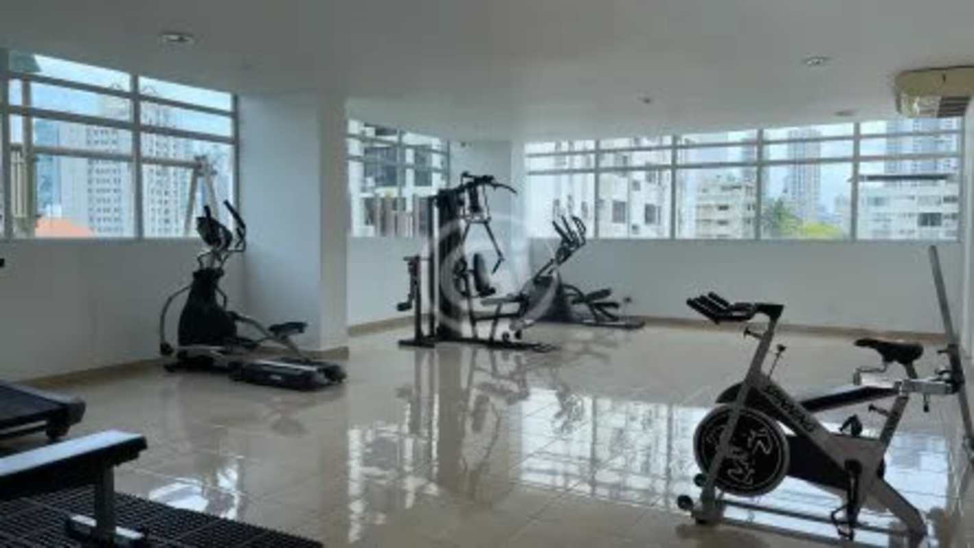 Bright gym with exercise equipment and windows PH Mont Royale El Cangrejo Panama