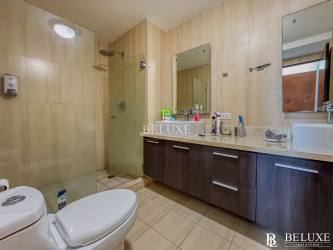 Bedroom with AC, ceiling fan, and ocean view balcony PH Water Ways Playa Blanca Panama