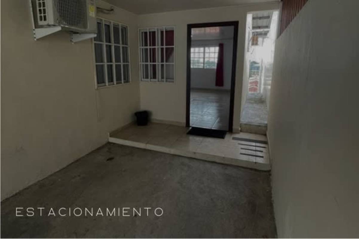 Covered parking garage with concrete floor air conditioning unit house in Cerro Viento Panama for sale