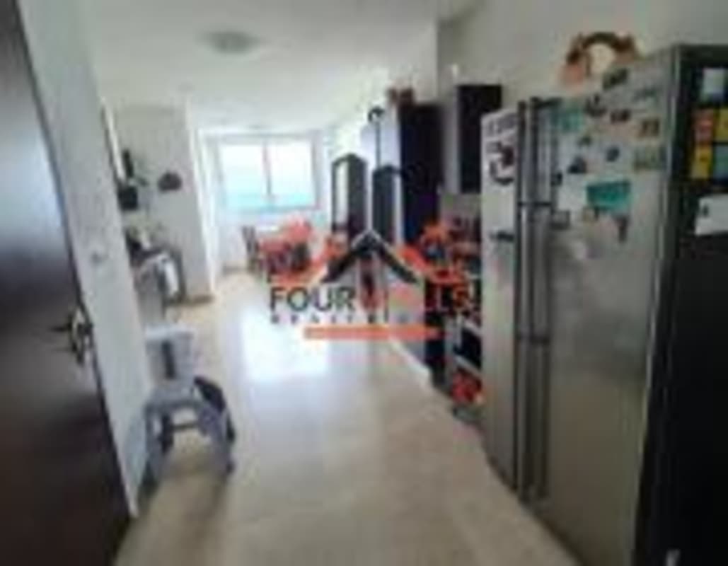 Spacious master bedroom with floor-to-ceiling ocean view windows Pearl at the Sea Costa del Este Panama