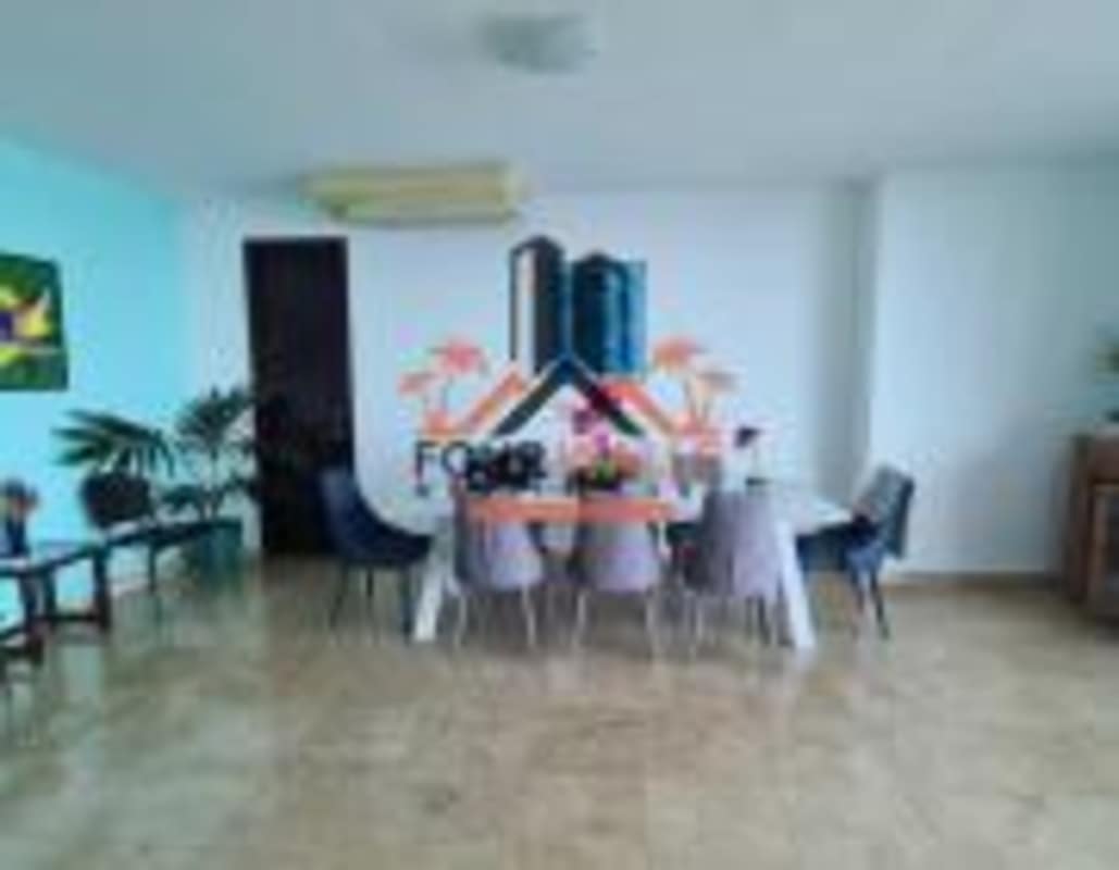 Dining room with ocean view windows marble floors in PH Pearl at the Sea Costa del Este Panama