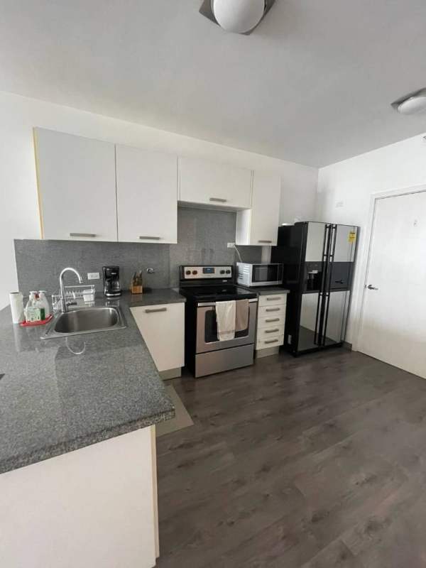 Modern bathroom with glass shower in PH BICSA luxury apartment Avenida Balboa Panama