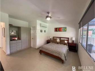 Spacious kitchen with appliances and granite counters in Nueva Gorgona beach house Panama