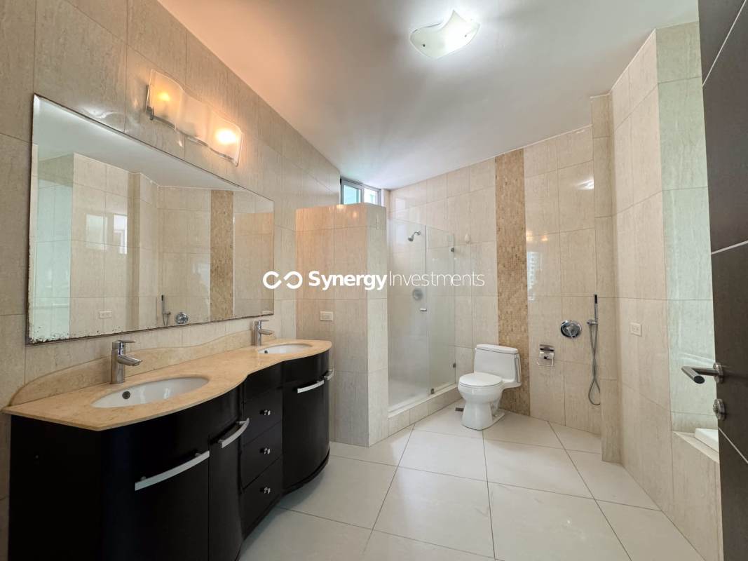 Contemporary kitchen with granite surfaces and stainless appliances in Allure at the Park Panama