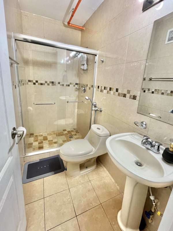 Second bedroom with large window, porcelain tiles, air conditioning, PH San Francisco Bay Panama