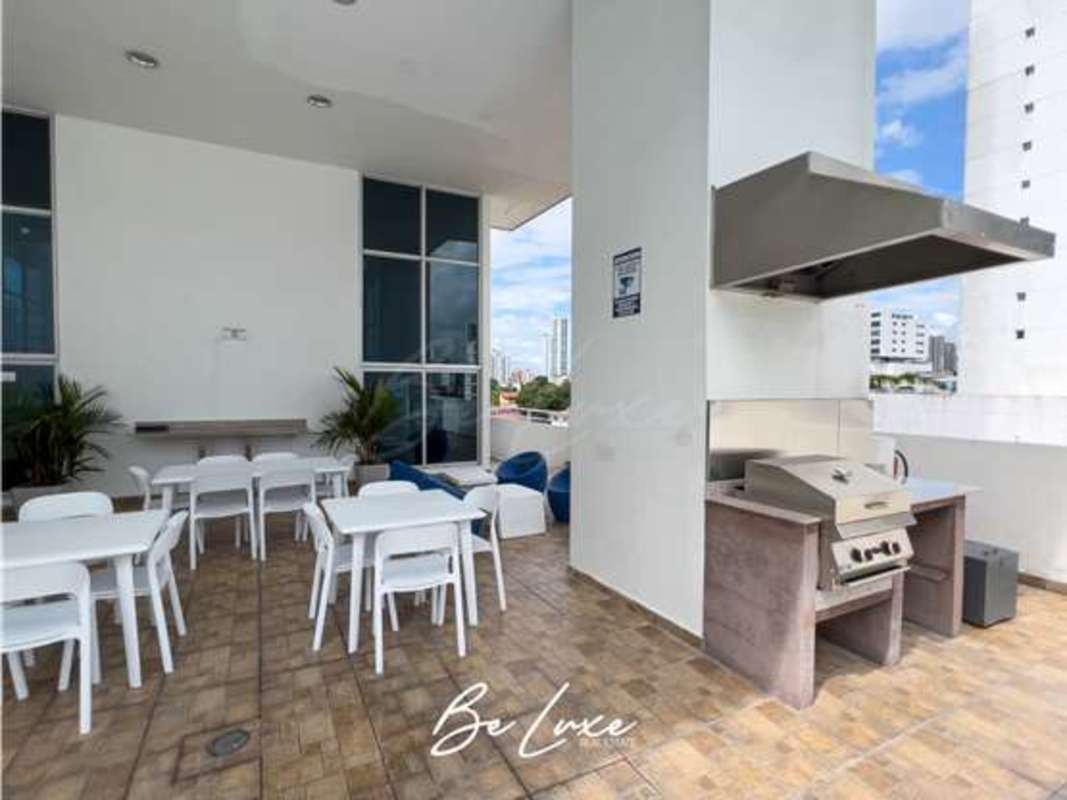 Private balcony with skyline views Panama City in PH Harmony Tower, high-rise apartment in San Francisco Panama