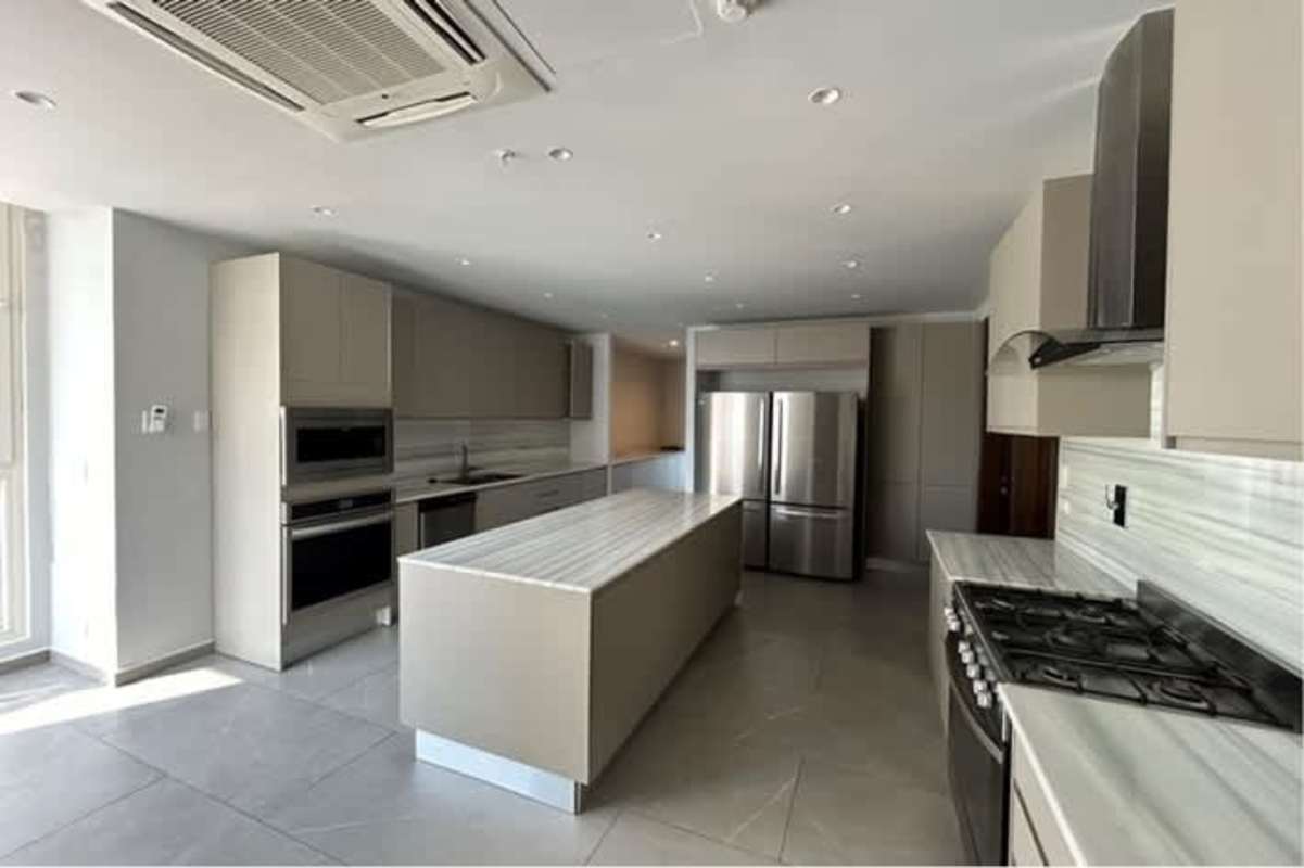 Bedroom with ocean views, marble flooring, large window in The Towers Punta Paitilla Panama