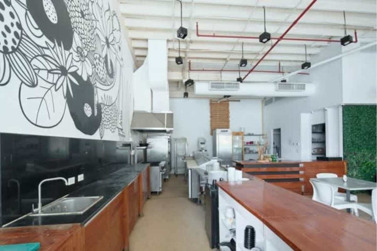 Modern commercial space for restaurant with industrial design, open counters, mural walls at Balboa Boutique Panama