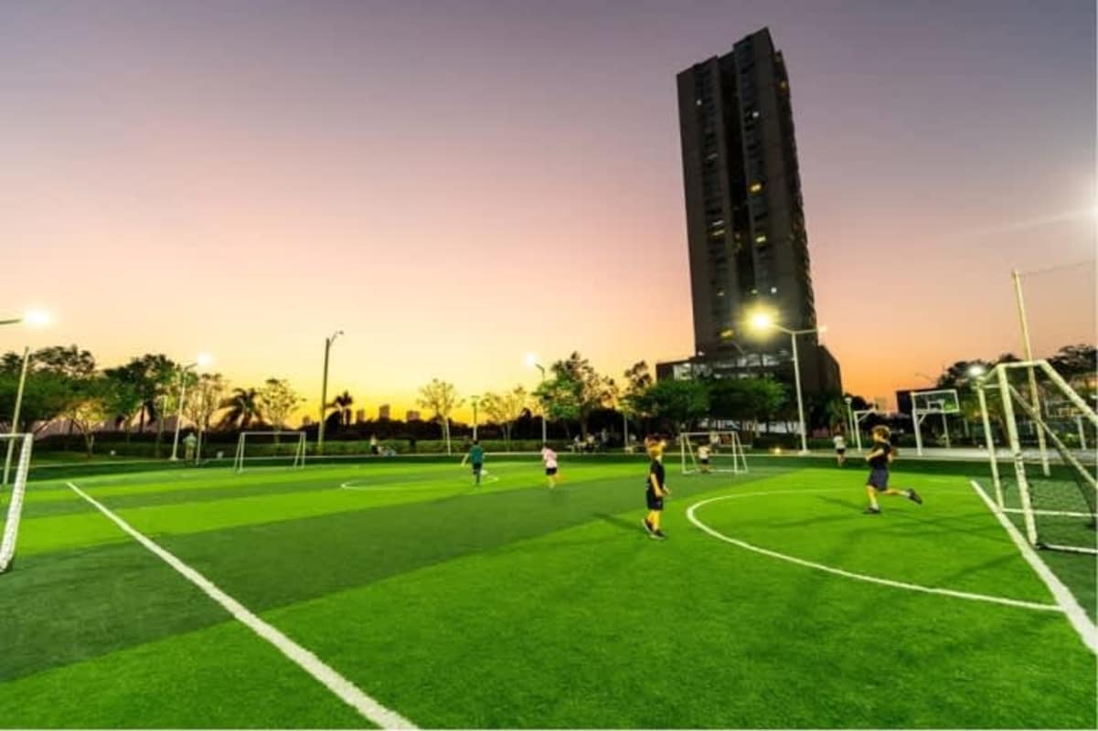 Outdoor sports facilities with football courts and tower PH Kai Costa del Este Panama City