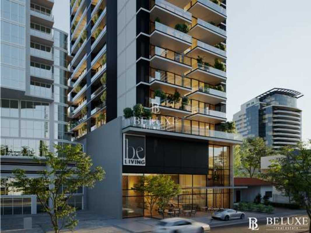 Modern residential skyscraper PH Be Living with balconies and greenery in San Francisco district Panama City