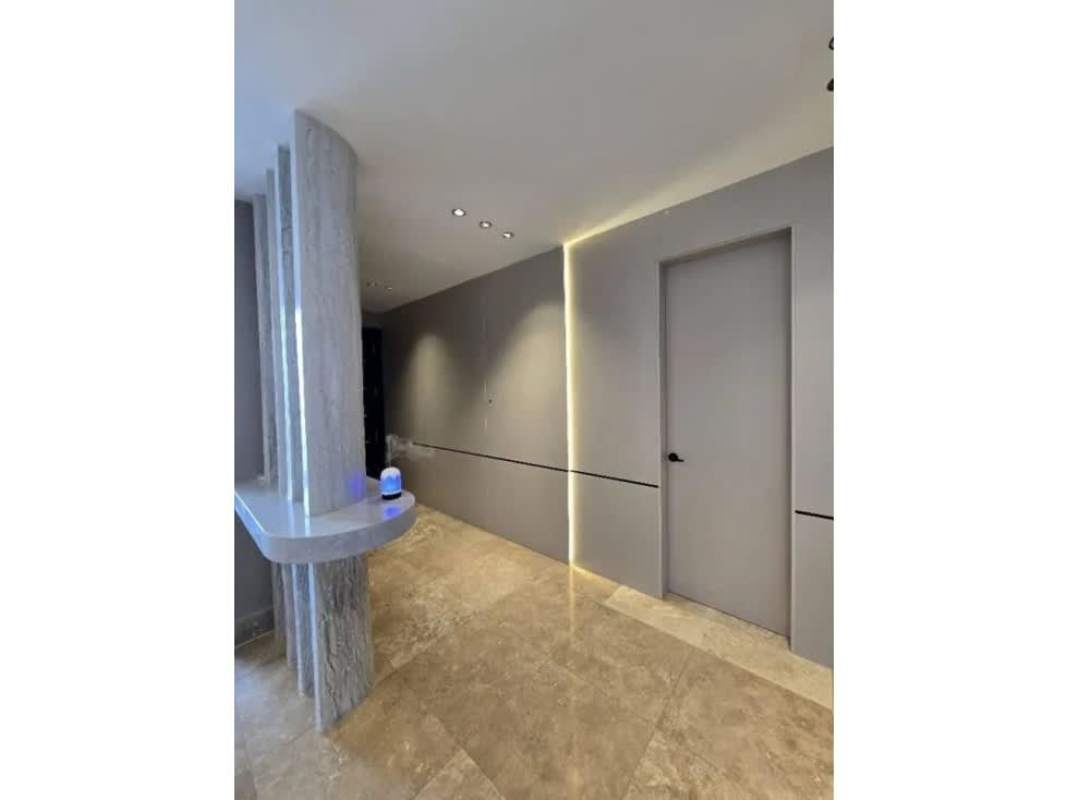 Fully equipped kitchen with granite tops and modern cabinetry in PH Oceania Punta Pacifica Panama