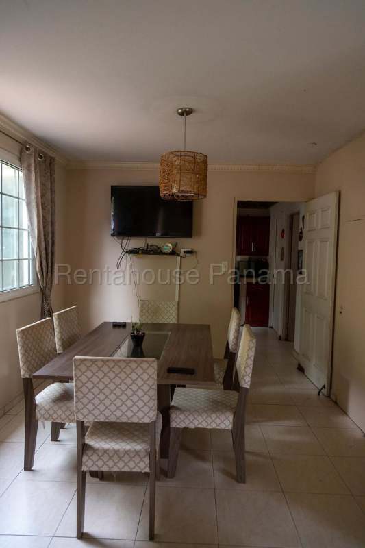 Kitchen with stainless steel appliances, granite counter, and natural lighting in Brisas del Golf Panama