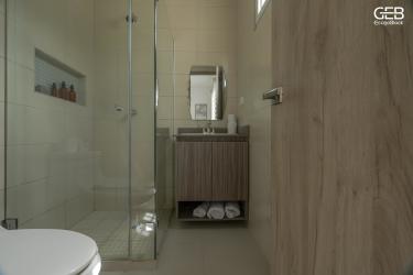 Bathroom with modern tile, walk-in shower and vanity in new house La Villa de Los Santos Panama