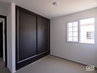 Bedroom space with sliding wardrobe in Luna Tableña House Las Tablas Panama
