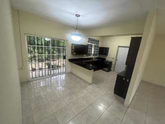 Large green backyard with garden ideal for families and pets in Howard Panama