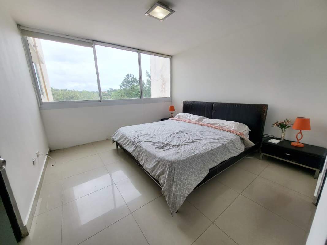 Home office room with sofa desk and window in PH Pine Hill Clayton Panama City